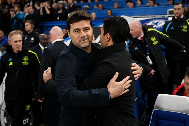 Mauricio Pochettino, Manager of Chelsea, embraces Mikel Arteta, Manager of Arsenal, prior to the Premier League match between Chelsea FC and Arsenal FC at Stamford Bridge on October 21, 2023